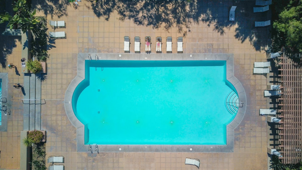 A drone shot of a swimming pool