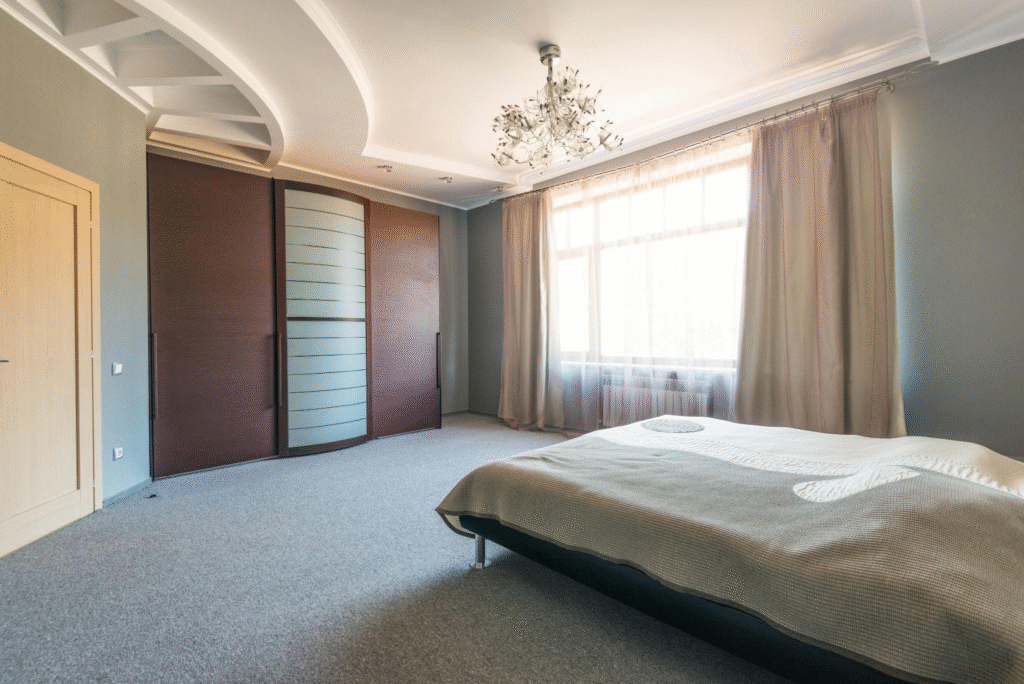 Luxury condo bedroom in a high-rise home in West Palm Beach.